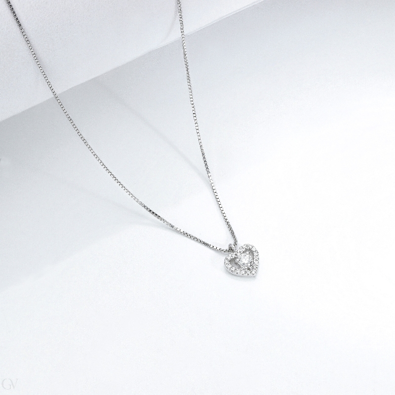 Necklace in white gold 18k with heart pendant with diamonds Necklace in white gold 18k with heart pendant with diamonds