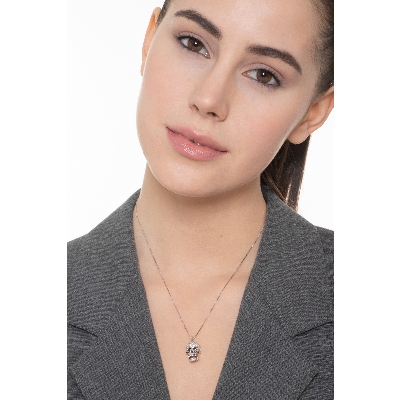 750 white gold necklace with skull in black and white diamonds