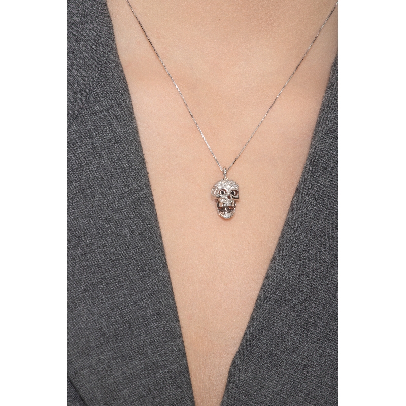 750 white gold necklace with skull in black and white diamonds 750 white gold necklace with skull in black and white diamonds