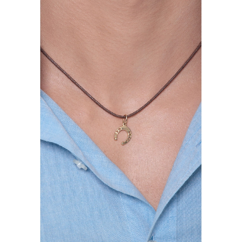 Horseshoe pendant in 18k yellow gold Horseshoe pendant in 18k yellow gold
